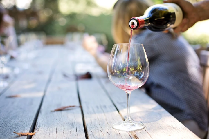 a close up of a glass of wine